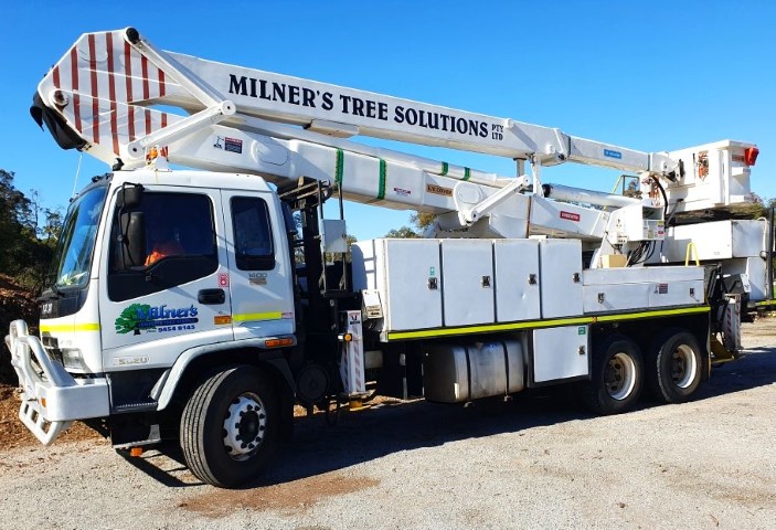 Milner's tree solutions extendable boom elevated work platform truck used for tree lopping